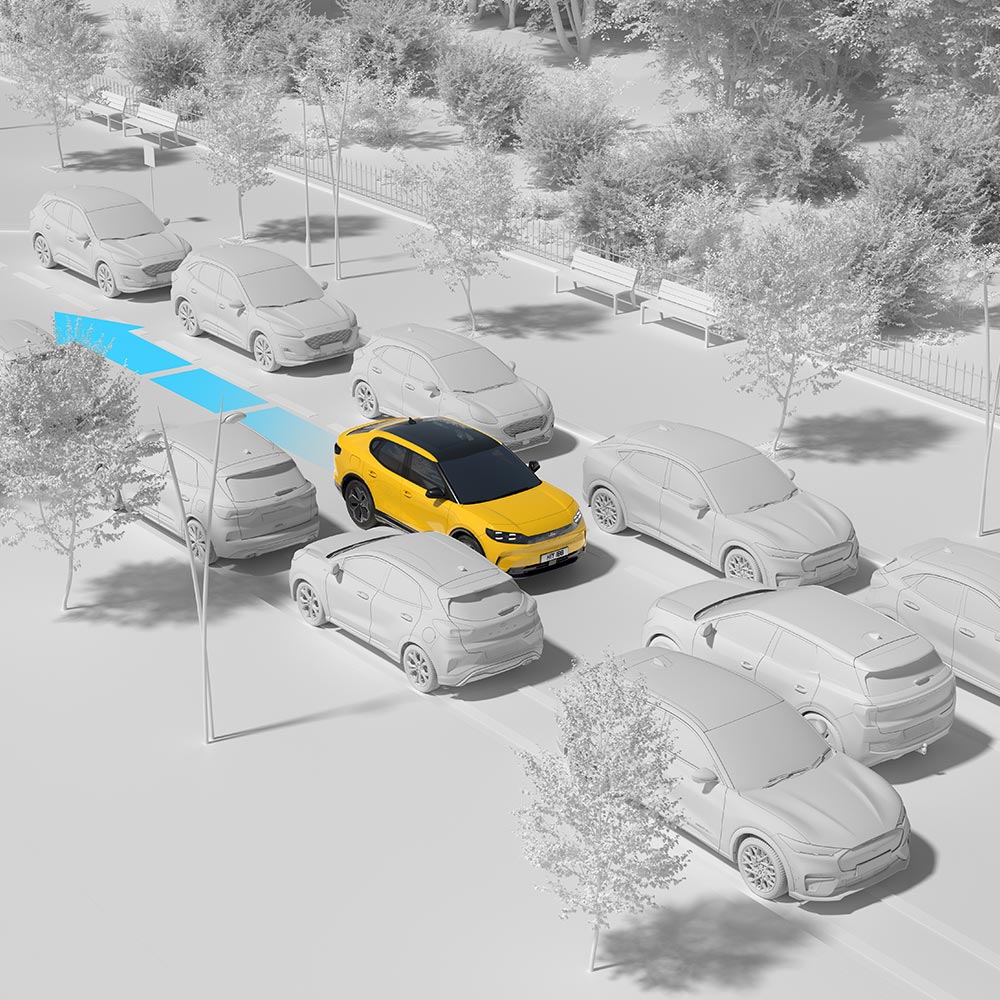 Un véhicule Ford jaune naviguant dans le trafic, mettant en évidence l'aide au stationnement arrière du véhicule.